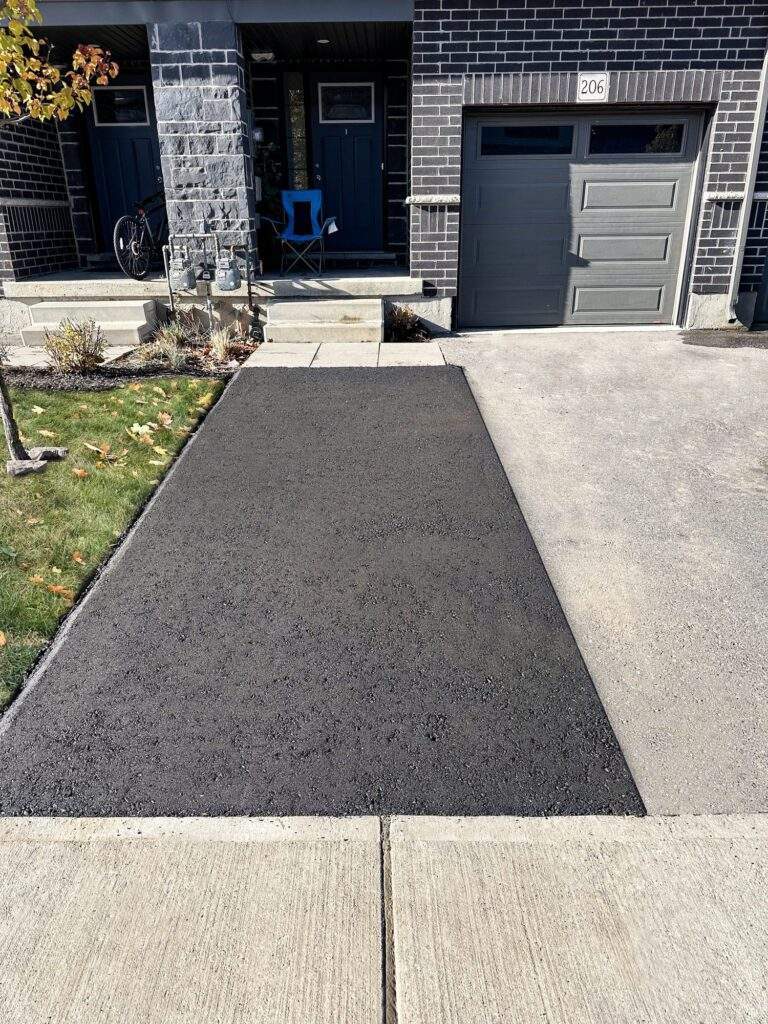 Paved area at the entrance to a house, done by Action Paving