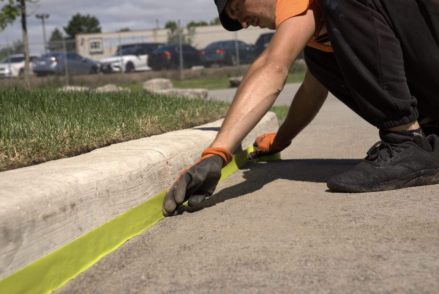 A man from Action Paving working on the road